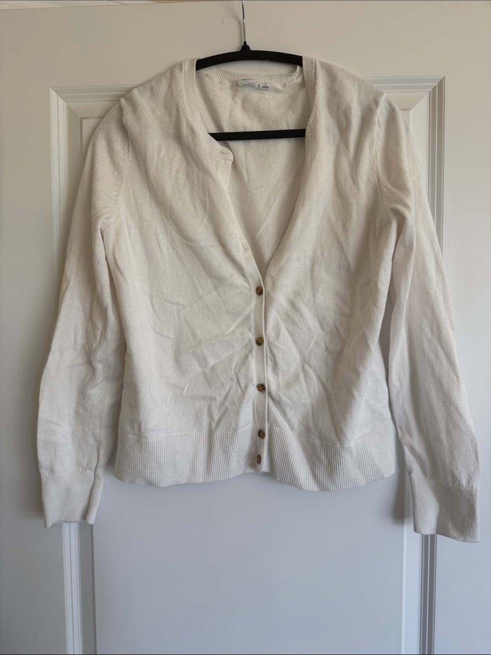 Gap white button down cardigan with brown faux fossil buttons